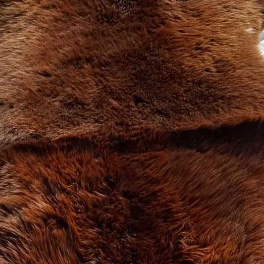 Double mouflon brown sheepskin rug